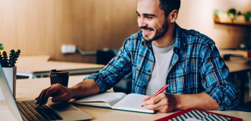 man working on affiliate marketing with a blog