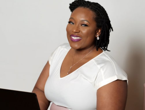 Felicia Kelly working on her computer