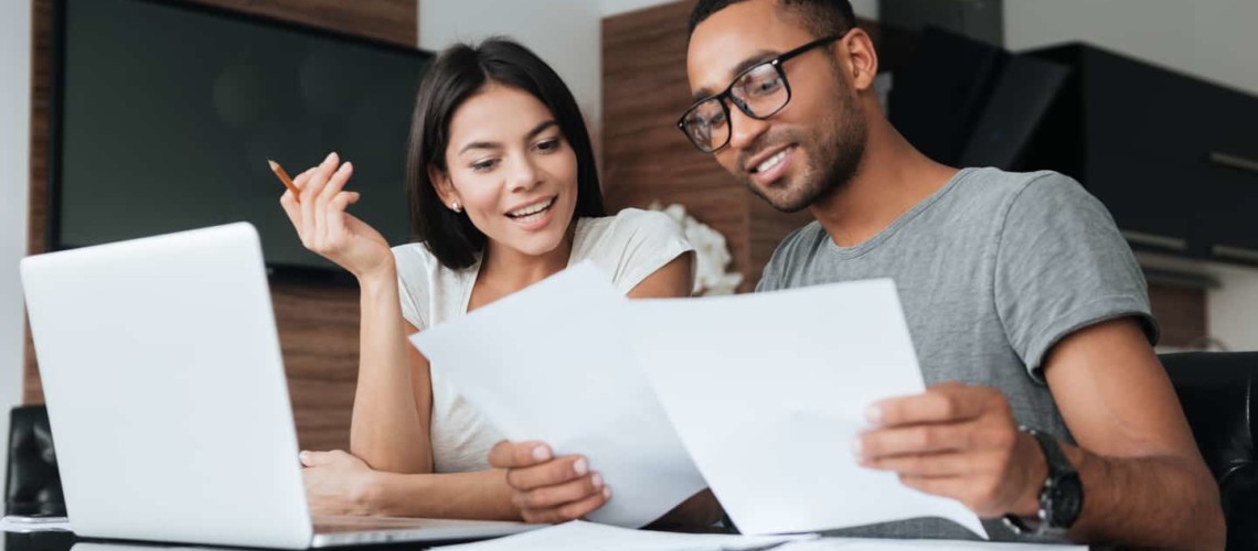 couple reviewing debt payoff plan