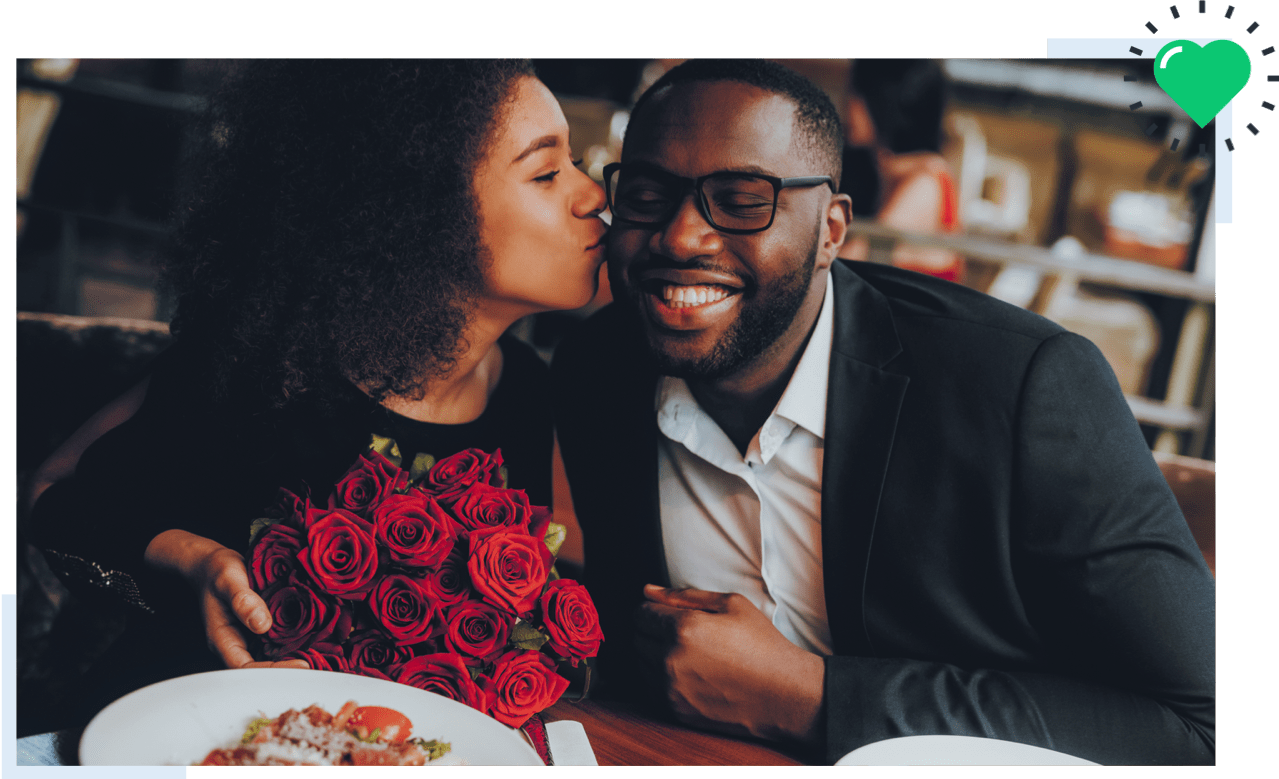 man and a woman on a date with roses
