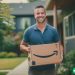 man carrying amazon box