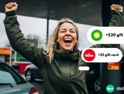 woman uses free gas cards to save on fuel