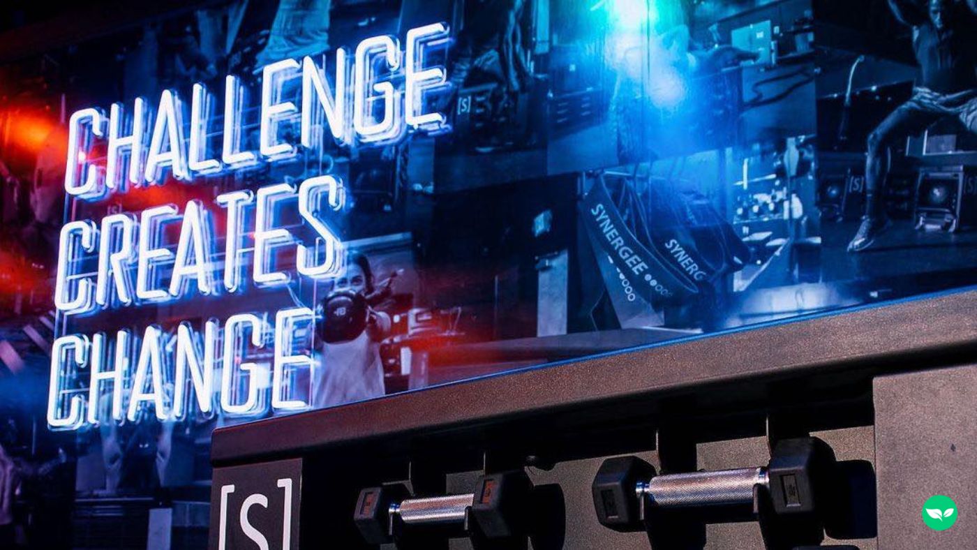 Neon sign that says "Challenge Creates Change"