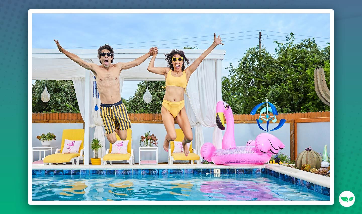 Two guests jumping into Crail and Joey’s pool with colorful floaties and cabana setups in the background, showcasing a lively and inviting environment