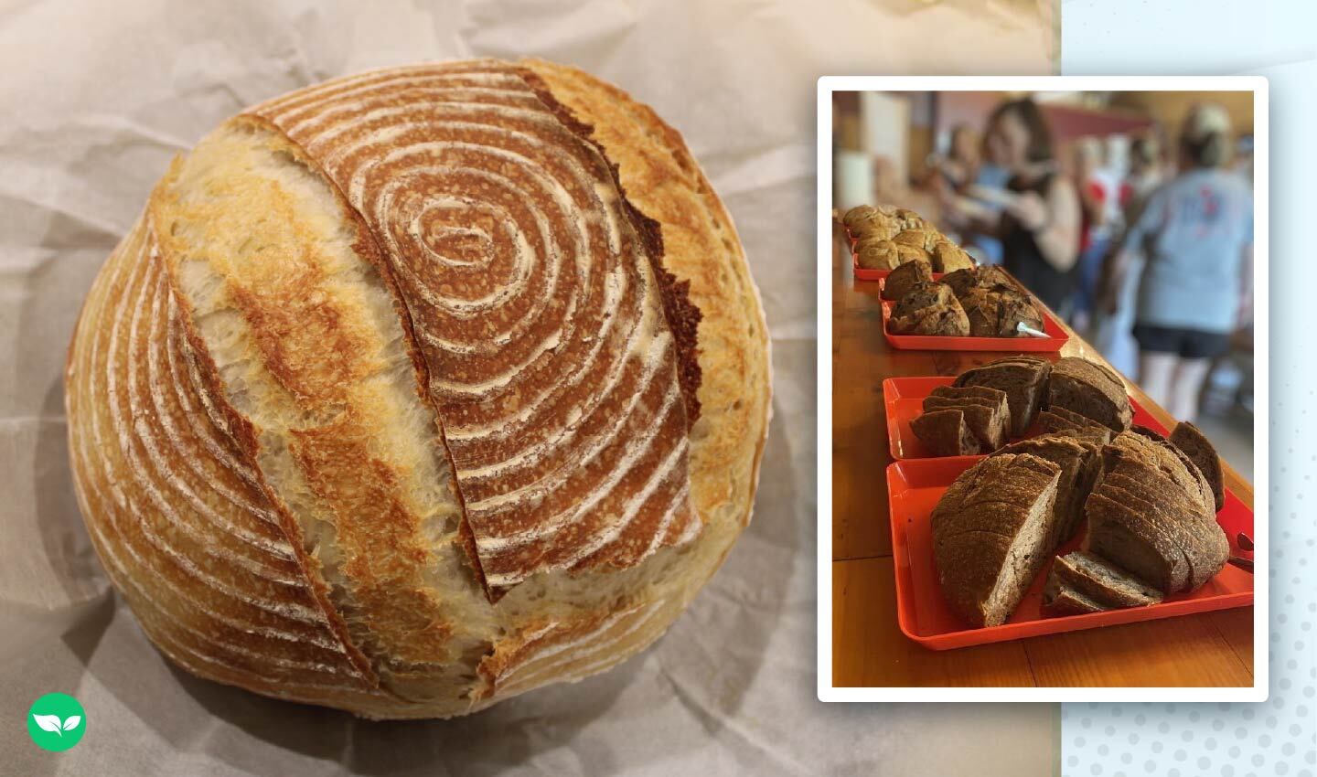 Freshly baked sourdough with a spiral crust pattern, alongside trays of sliced bread ready for guests to sample.