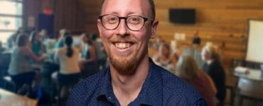 Portrait of Dan Ansaldo, founder of Kansas City Sourdough, inside the KC Wine Co event space.
