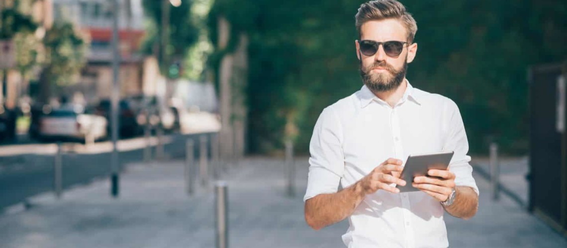 man reviewing passive income ideas online